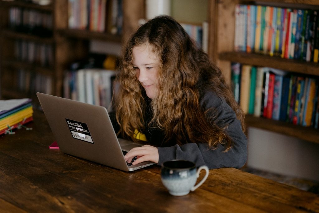 Woman looking at laptop computer